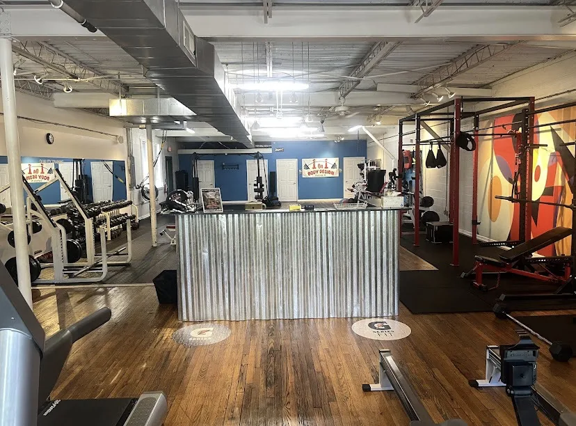 Main training floor with the mural wall at I Already Won Fitness